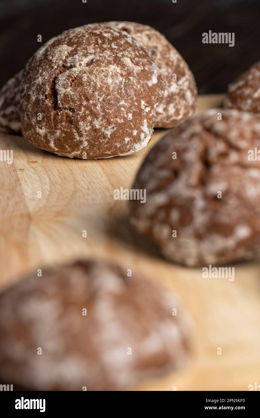Fresh chocolate gingerbread on the kitchen table, sweet desserts with ...