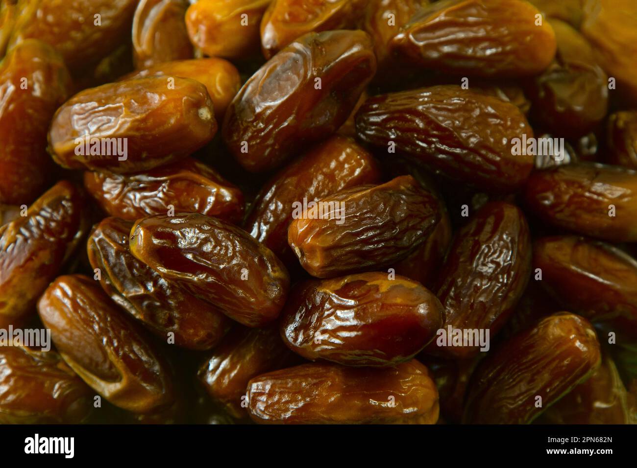 Dates. Dried date palm fruits. Healthy sweet snack food Pile of tasty dry dattes. Date harvest