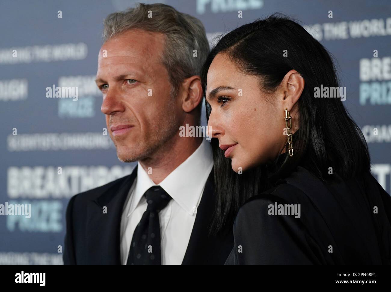 Jaron Varsano, left, and Gal Gadot arrive at the ninth Breakthrough