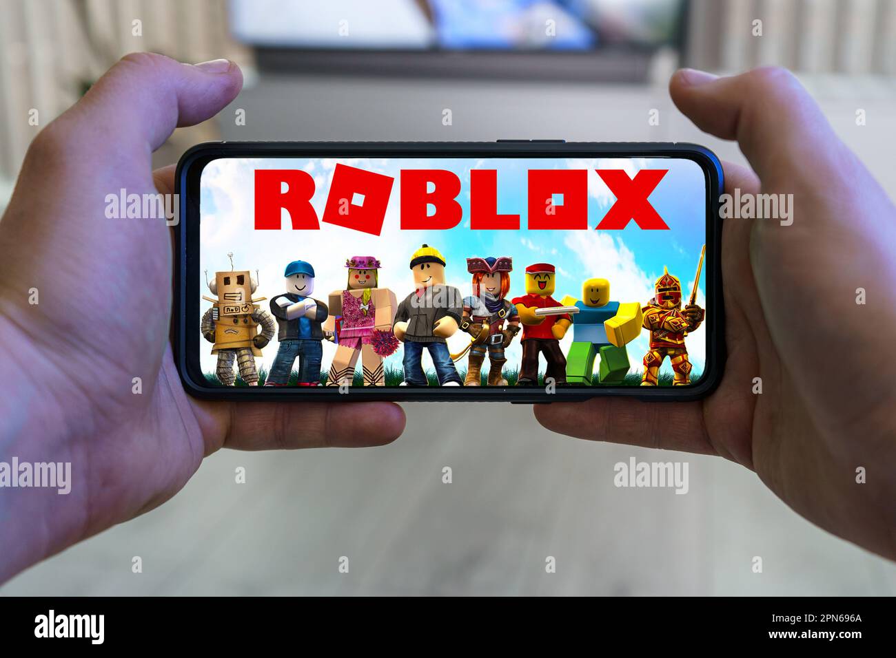 Roblox Game App On The Smartphone Screen With The Game Screen Blurred In  The Background. Rio De Janeiro, RJ, Brazil. May 2021. Vertical Stock Photo,  Picture and Royalty Free Image. Image 168673290.