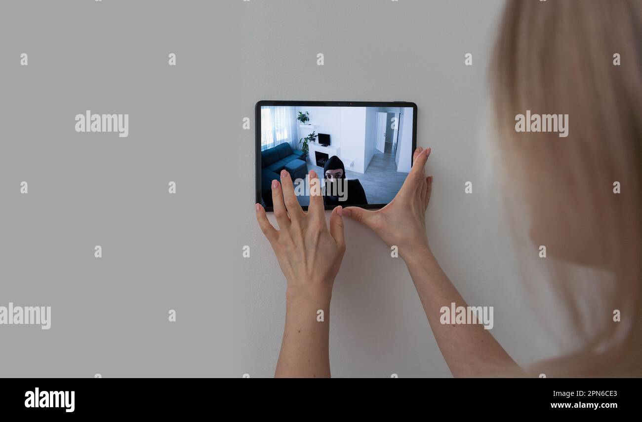 tablet with view from CCTV cameras. Home security system Stock Photo