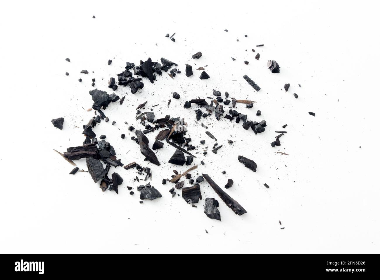 Black charcoal particles isolated on a white background, Activated