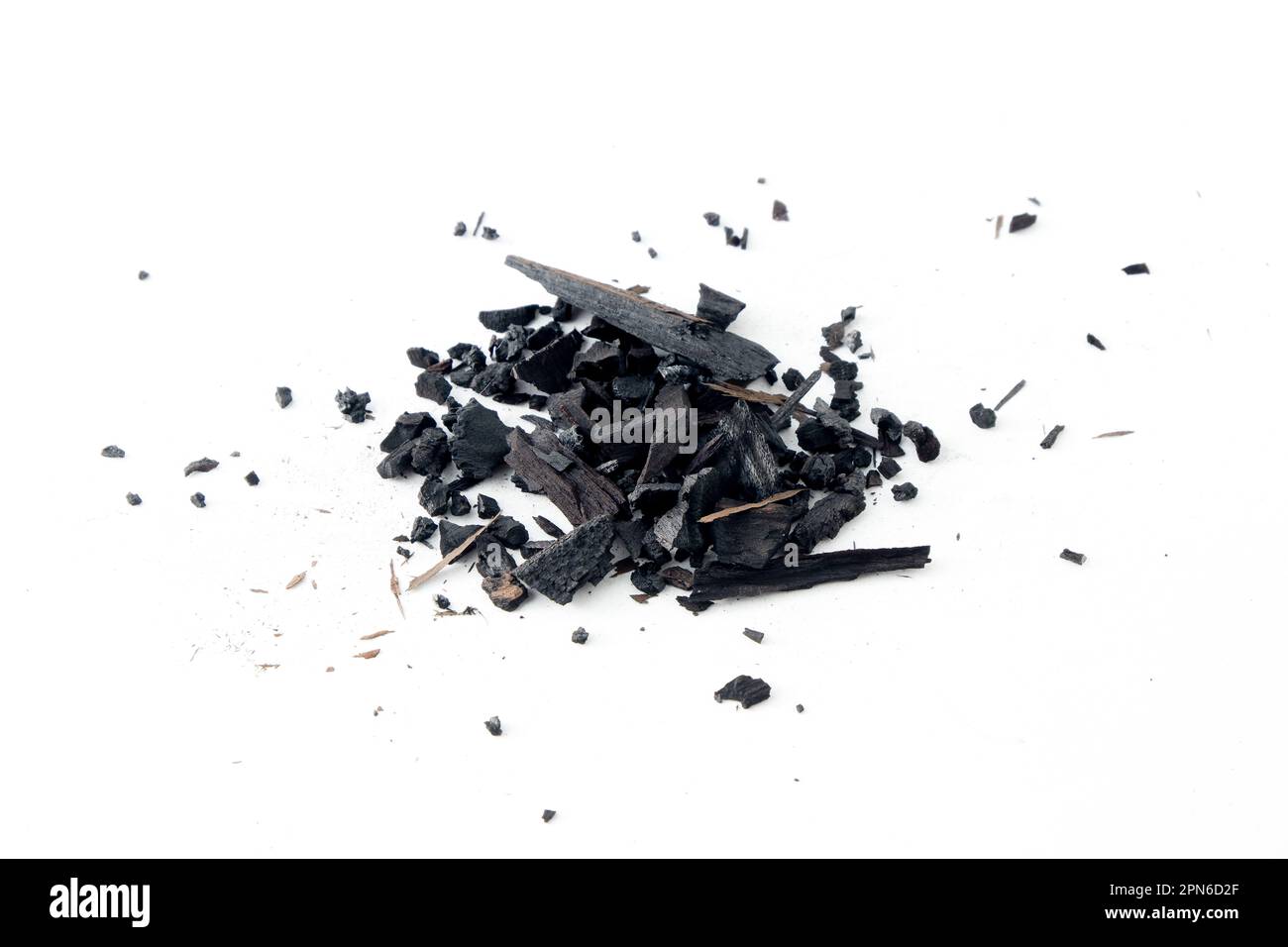 Black charcoal particles isolated on a white background, Activated charcoal powder Stock Photo