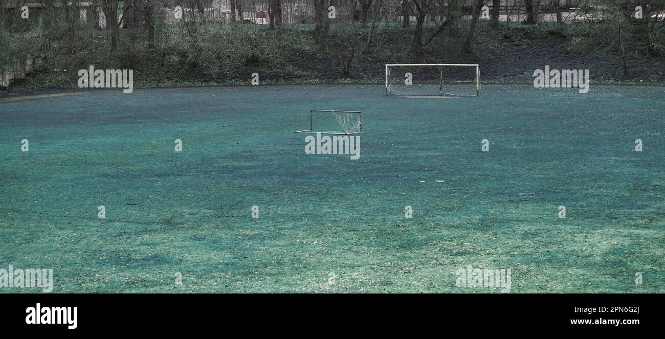 Abandoned football field in rustic area. nostalgia concept. exclusion