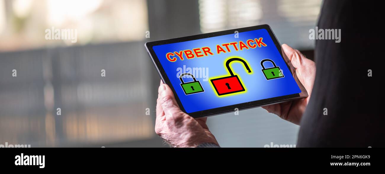 Tablet screen displaying a cyber attack concept Stock Photo - Alamy