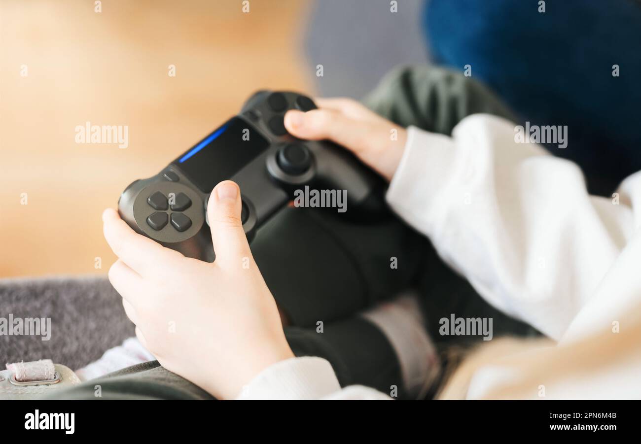 Premium Photo  Boyfriend cheering her beautiul girlfriend while she's playing  online games using wireless controller. room with neon light.