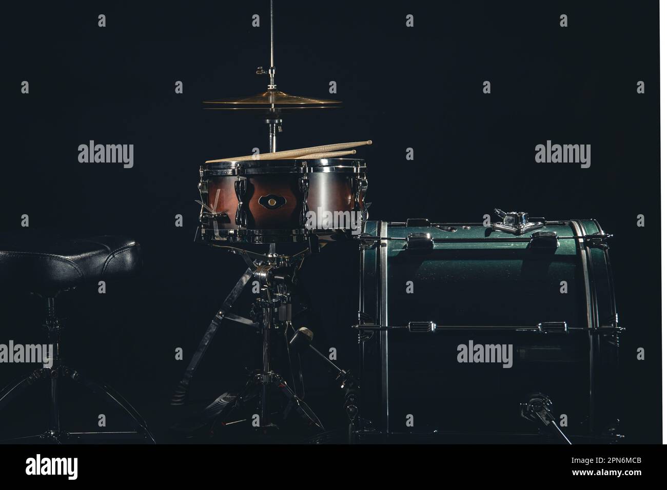 Black hands on drum kit hi-res stock photography and images - Alamy