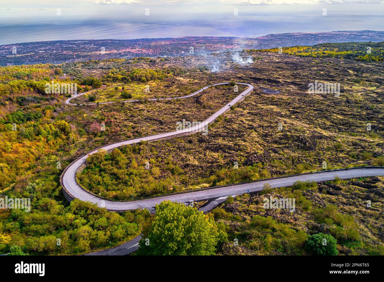 Aerial view of the road on the slopes of the Etna volcano. Volcanic earth. Black volcanic sand. Etna National Park, Sicily, Italy, Europe Stock Photo