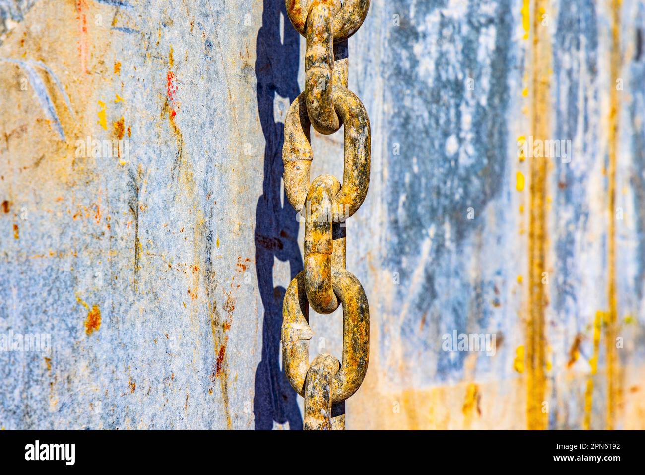 Chain over metal cargo container Stock Photo