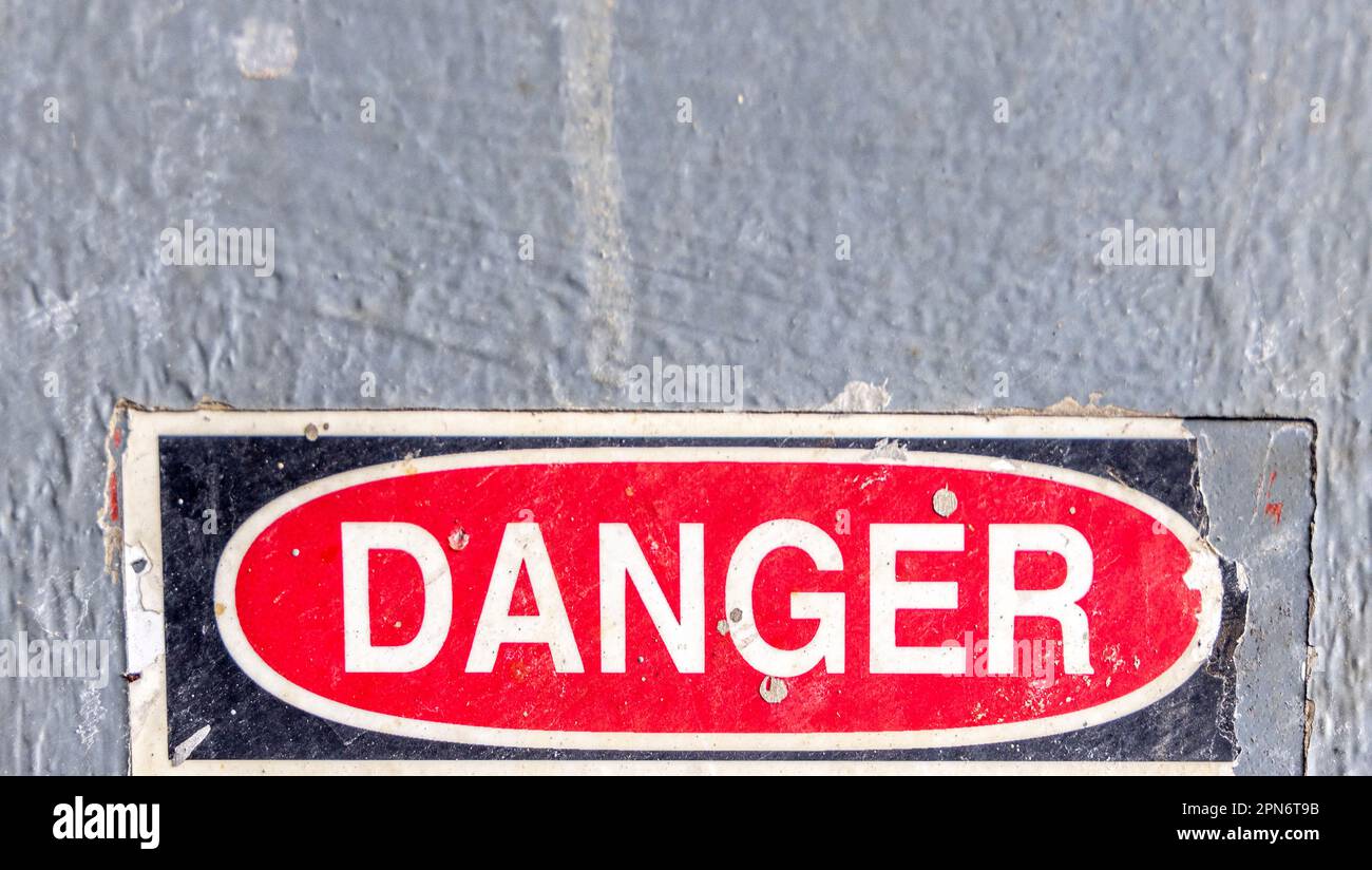 Danger signs in industrial settings Stock Photo - Alamy
