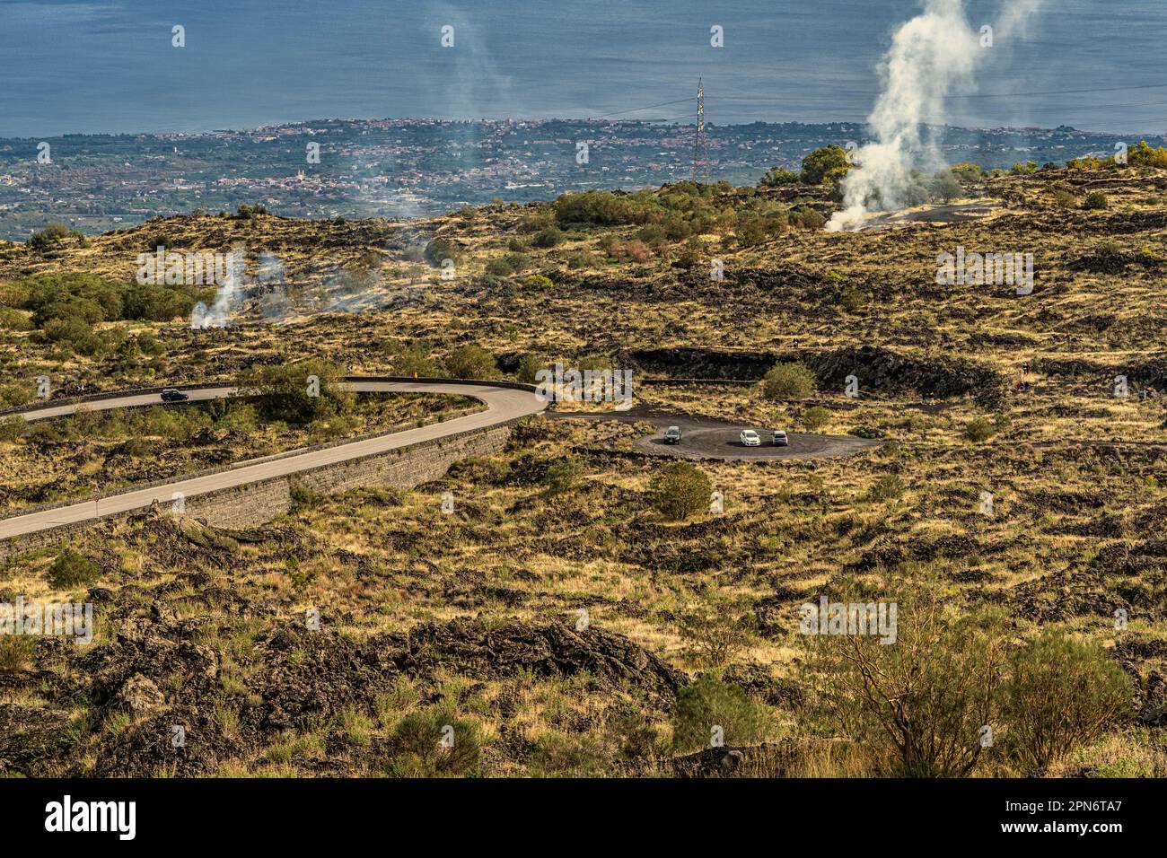 Aerial view of the road on the slopes of the Etna volcano. Volcanic earth. Black volcanic sand. Etna National Park, Sicily, Italy, Europe Stock Photo