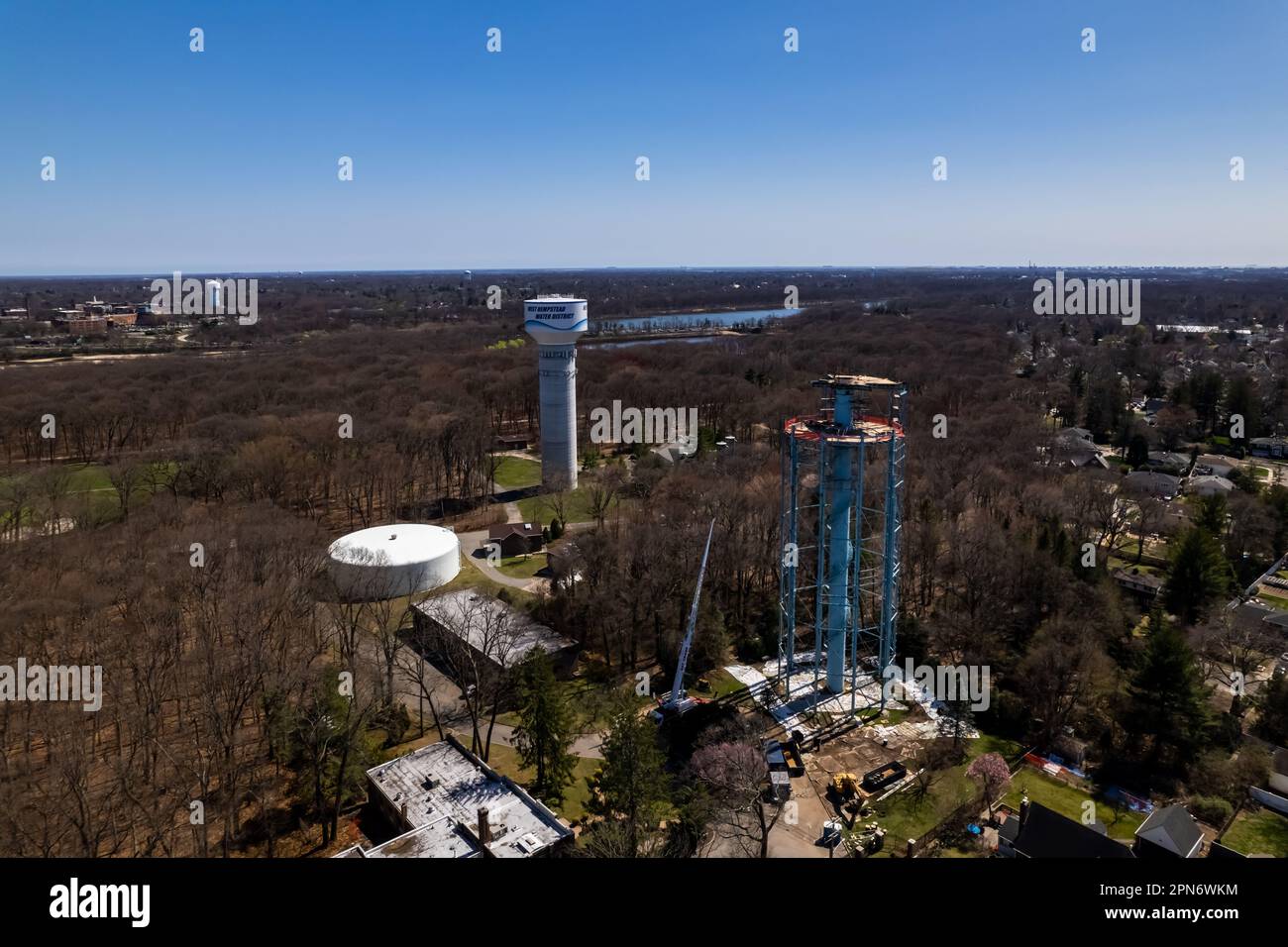 An aerial view of the deconstruction process of the old water tower in