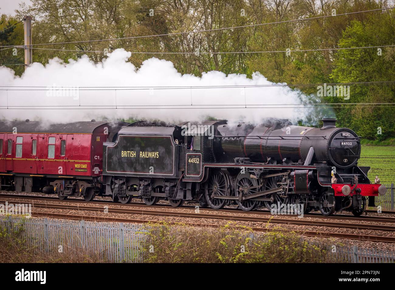 Black Five Stanier locomotive number 44932 at speed on the West Coast Main Line. Stock Photo
