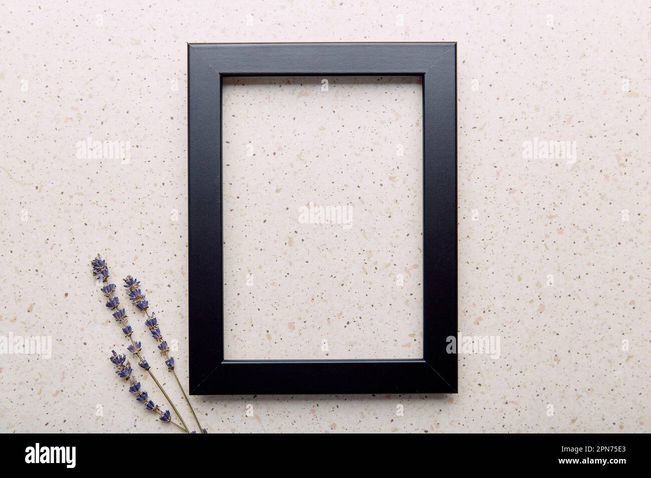 Empty interior black wall frame mockup, template with lavender. Aesthetic minimalist eco-friendly concept background. Stock Photo