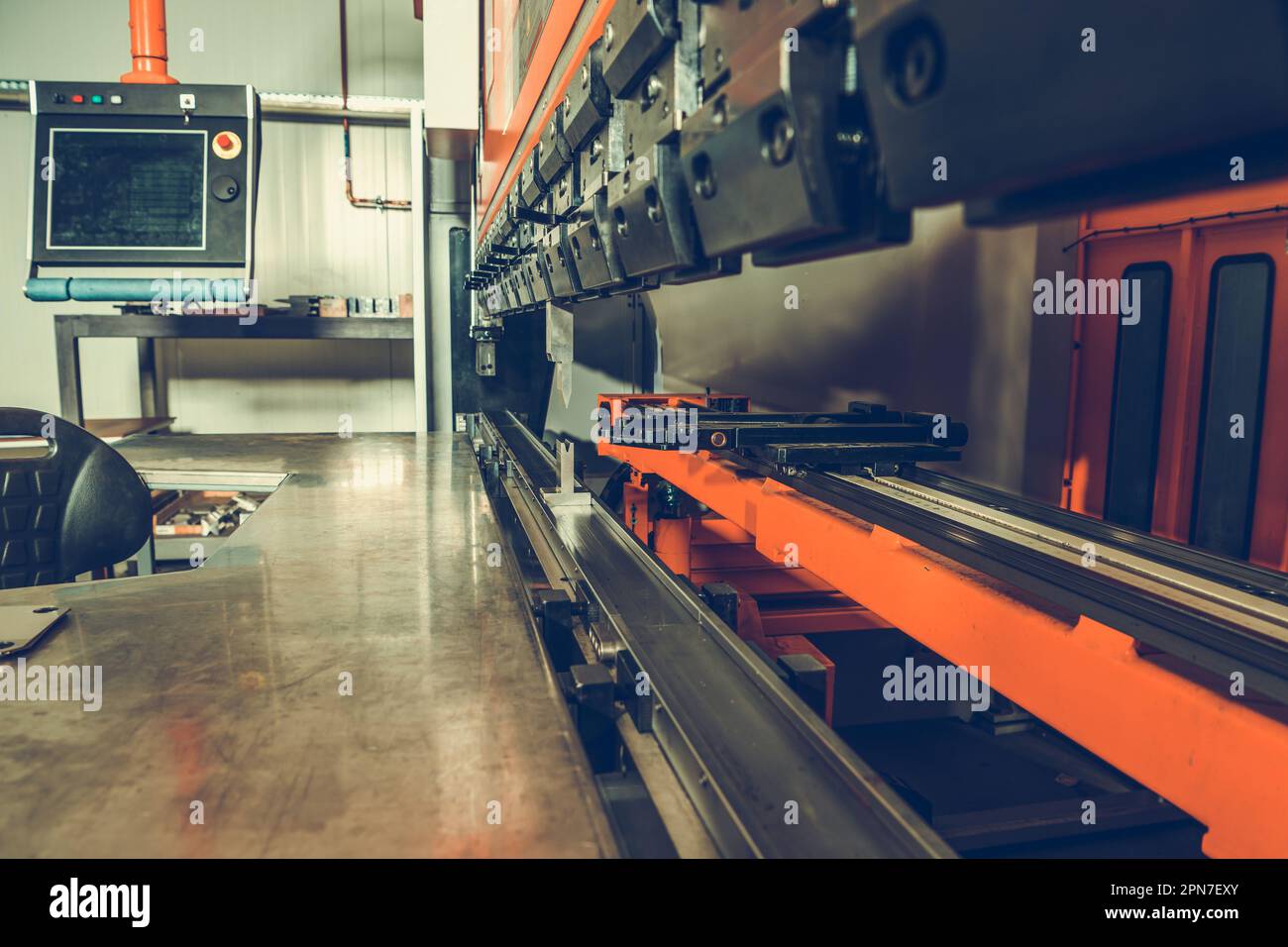 Industrial CNC Bending Machine at Manufacturing Plant. Professional Metalworking Machinery and