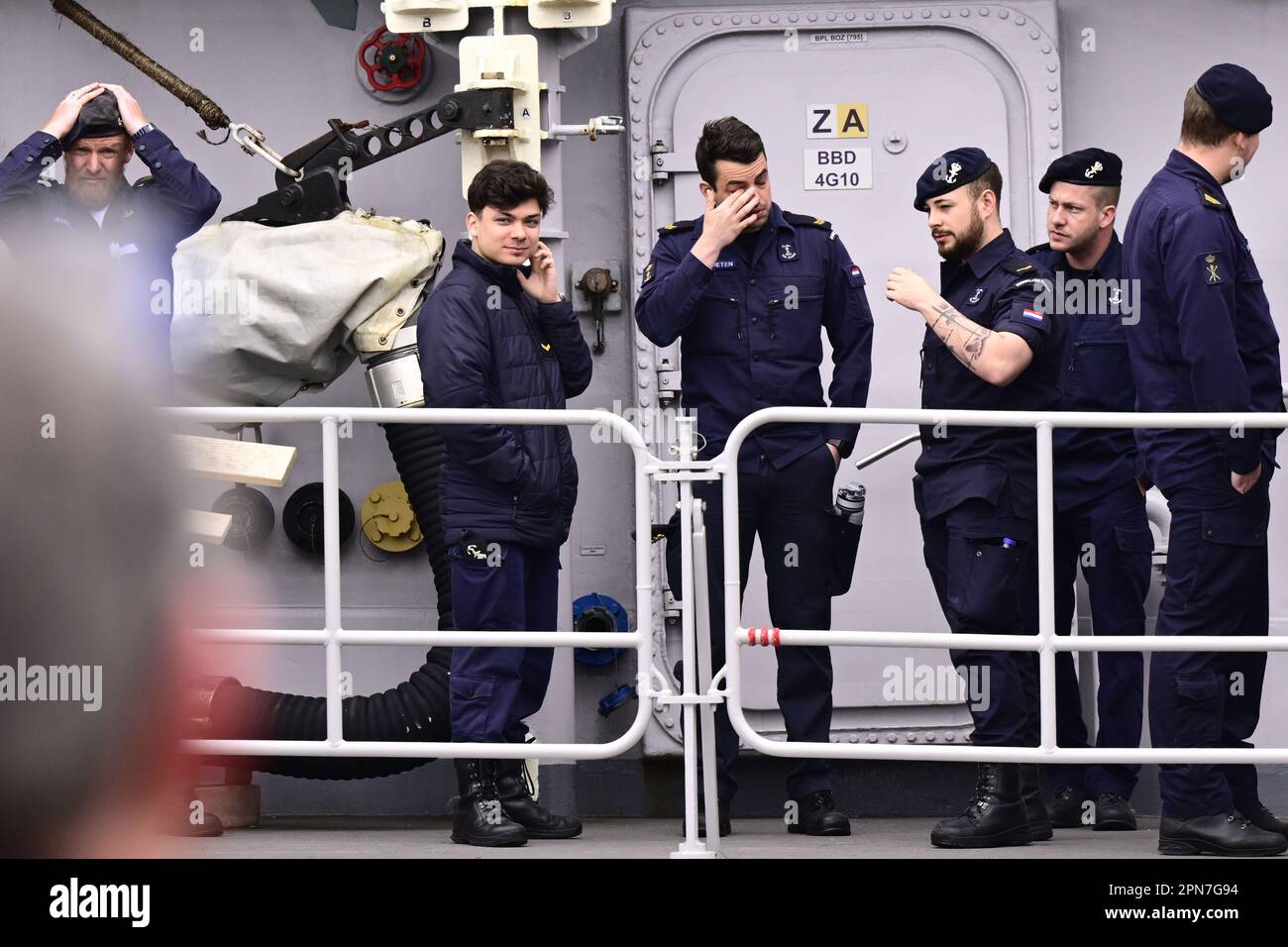 DEN HELDER, Netherlands - 17/04/2023, Crew members of the frigate Zr.Ms. Van Amstel say goodbye before departure. The naval vessel will become part of the Standing NATO Maritime Group 1 (SNMG1) and is one of the 4 rapidly deployable NATO fleets. The Zr.Ms. Van Amstel specializes in anti-submarine warfare. ANP OLAF KRAAK netherlands out - belgium out Credit: ANP/Alamy Live News Stock Photo