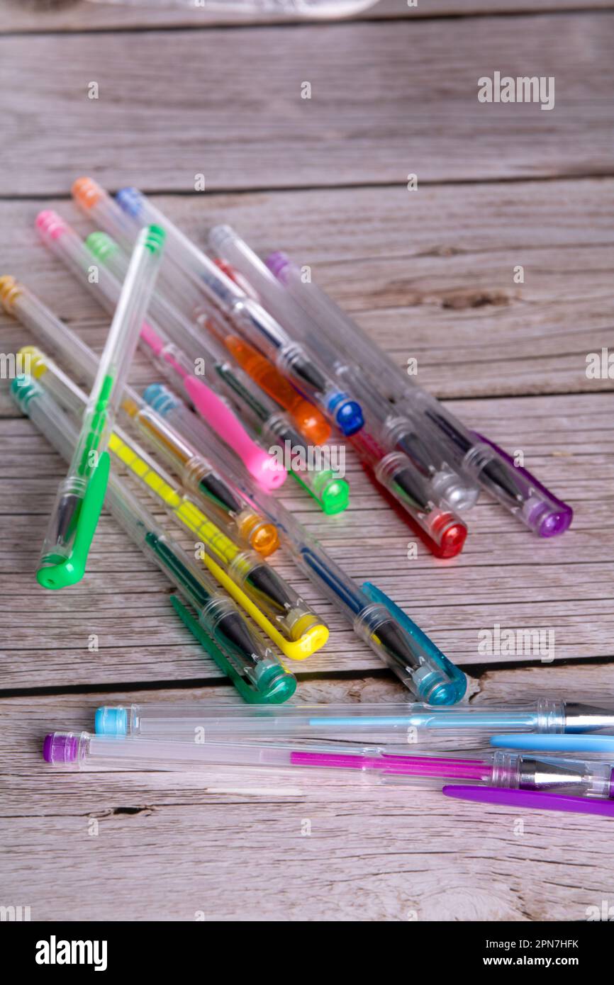 photo pile of colored pens on the table top view Stock Photo
