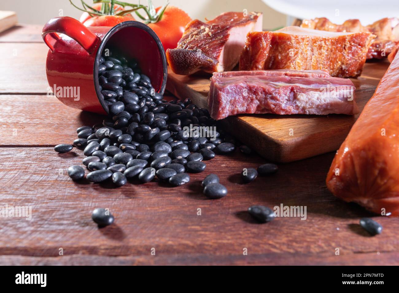 ingredients for brazilian traditional food feijoada. Stock Photo