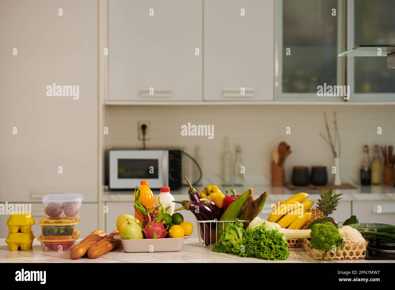 Furts Counter Kitchen counter with various fresh groceries, fruits and vegetables ...