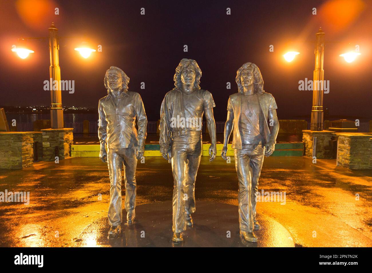 Bronze statue of the Bee Gees pop group by Andy Edwards, 2021, Loch Promenade, Douglas, Isle of Man Stock Photo