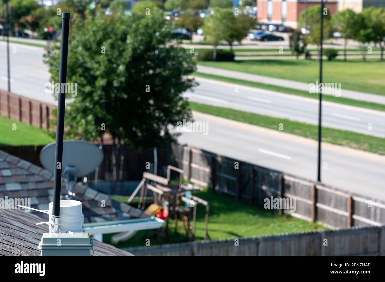 Des Moines, Iowa, USA - 9.2022 - Antenna mounted to the roof of a  residential house mining helium cryptocurrency Stock Photo - Alamy