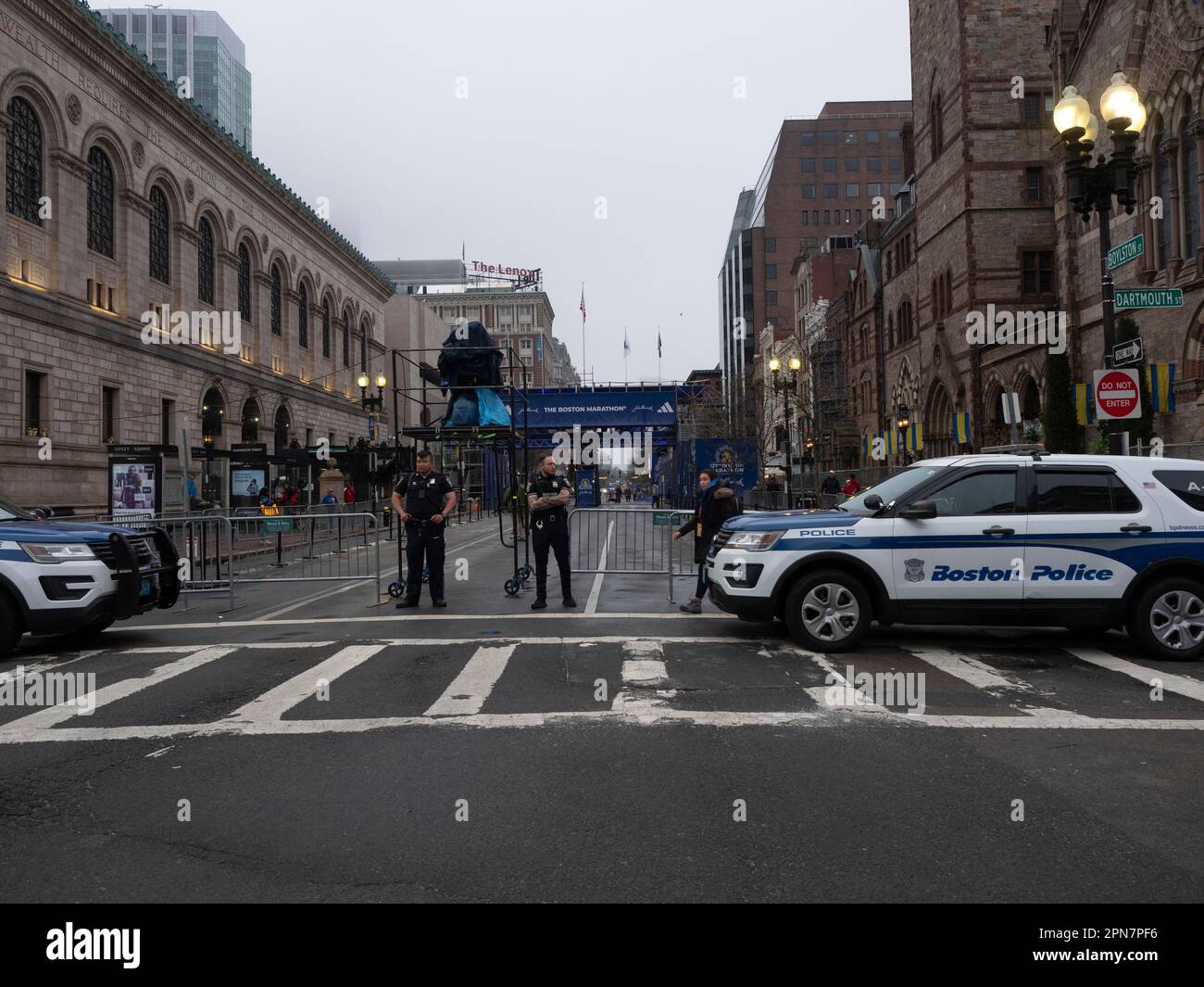 Boston, Massachusetts, USA. 17th Apr, 2023. Boston Police officers guard the finish line of the 127th Boston Marathon. Ten years ago, a bomb blast there killed three and injured scores of others. This year nearly 30,000 runners will run the 26.2 mile course, coming from more than 100 countries. (Credit Image: © Sue Dorfman/ZUMA Press Wire) EDITORIAL USAGE ONLY! Not for Commercial USAGE! Credit: ZUMA Press, Inc./Alamy Live News Stock Photo