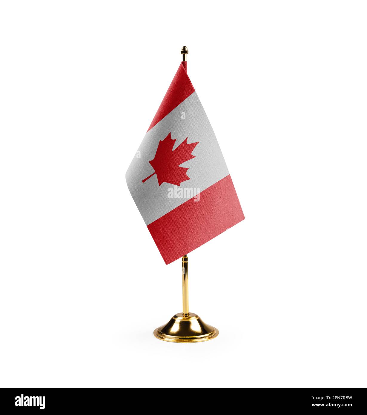 Small national flag of the Canada on a white background. Stock Photo