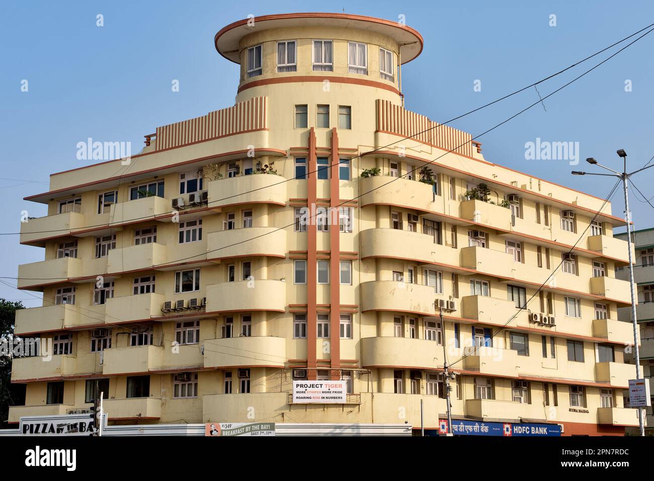 Soona Mahal, an art deco building (1937), housing private apartments and commercial enterprises; corner Veer Nariman Rd. / Marine Drive, Mumbai, India Stock Photo