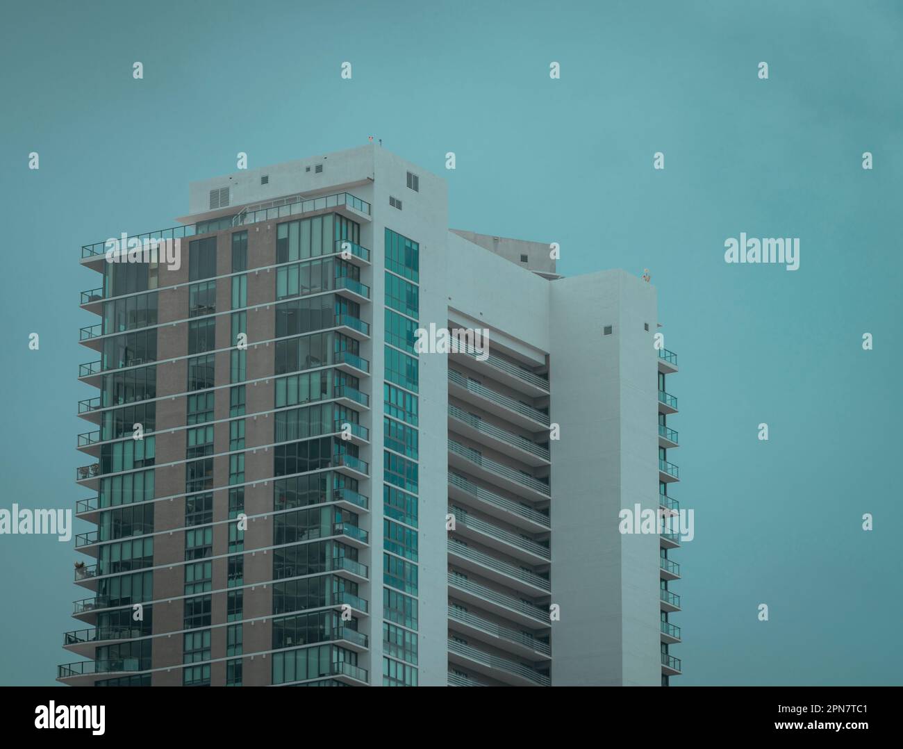 Proud Building A large, modern residential building, standing tall and proud against a ...