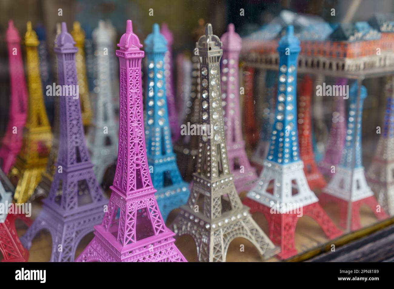 Eiffel tower souvenirs behind the gift shop window in Paris, France. Stock Photo