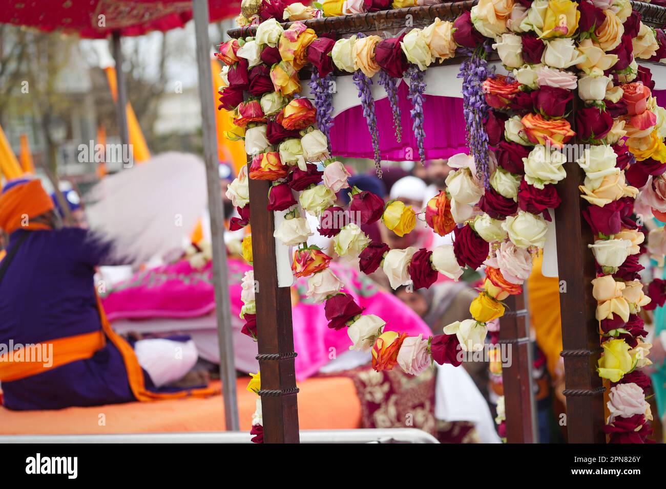 Nagar Kirtan procession, religious sikh event in the streets of the city. Marene, Italy - April 2023 Stock Photo