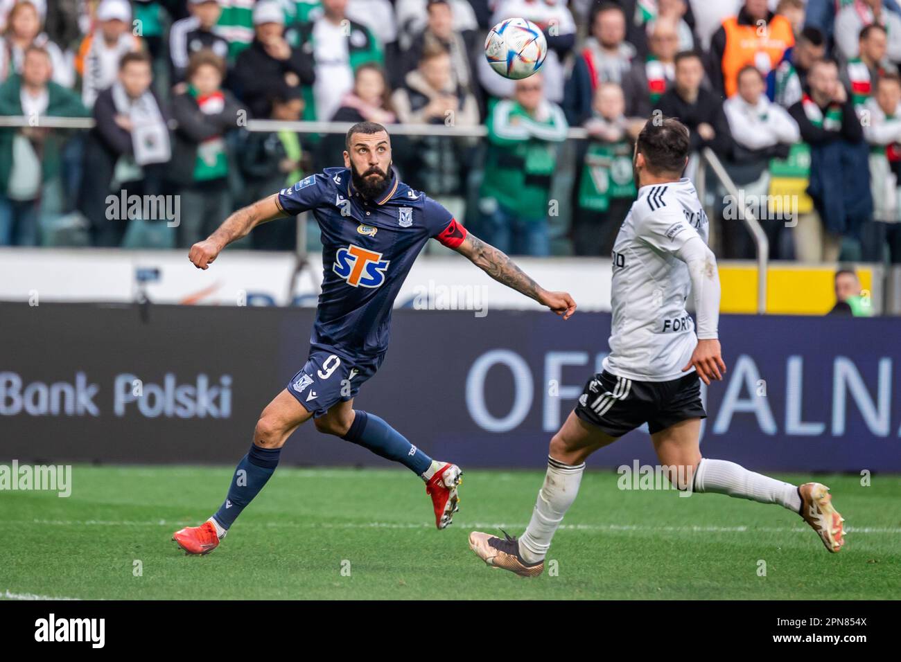 Warsaw, Poland. 16th Apr, 2023. Mikael Ishak (L) of Lech in action