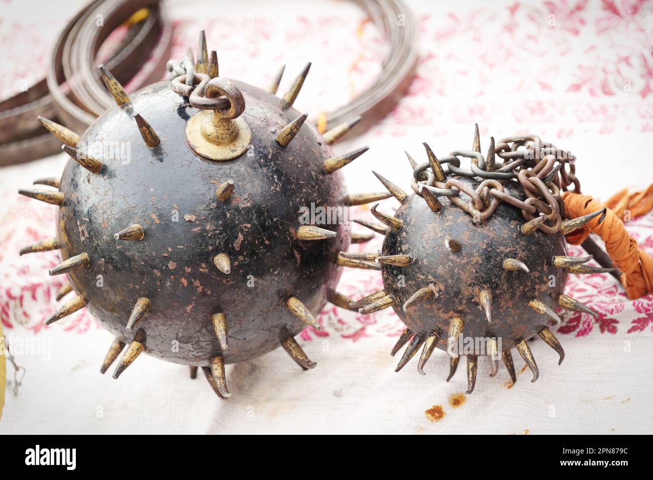 medieval weapon consisting of a heavy iron ball with spikes, which is attached to a strong chain Stock Photo