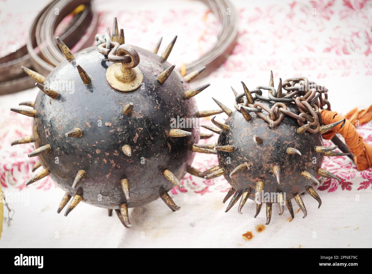 medieval weapon consisting of a heavy iron ball with spikes, which is attached to a strong chain