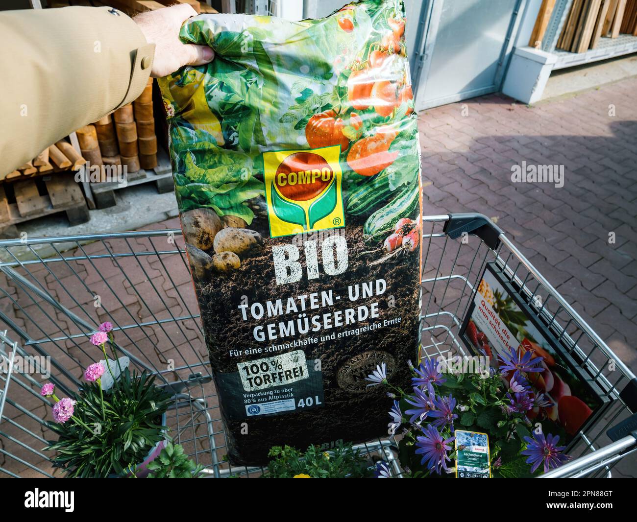 Frankfurt, Germany - Mar 4, 2023: Male customer hand holding in the ...
