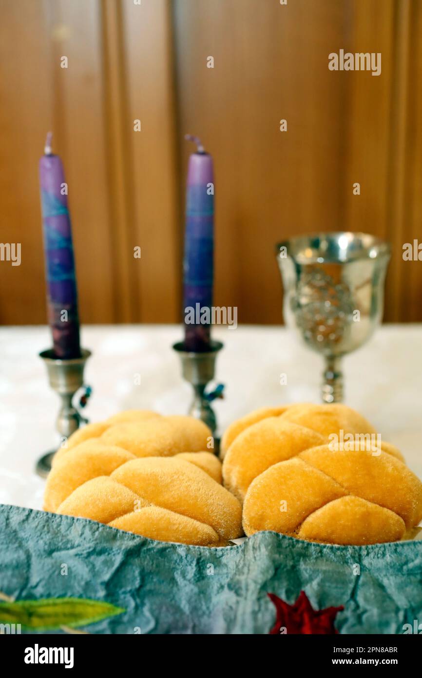 https://c8.alamy.com/comp/2PN8ABR/shabbat-with-challah-bread-on-a-wooden-table-candles-and-cup-of-wine-traditional-jewish-shabbat-ritual-shabbat-shalom-2PN8ABR.jpg