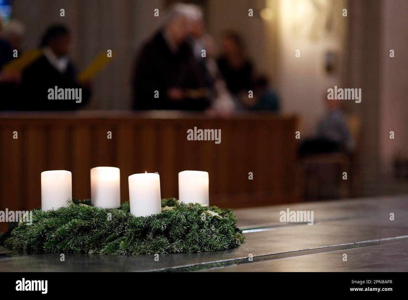 St Joseph church. Christmas mass celebration in a parish. Advent wreath