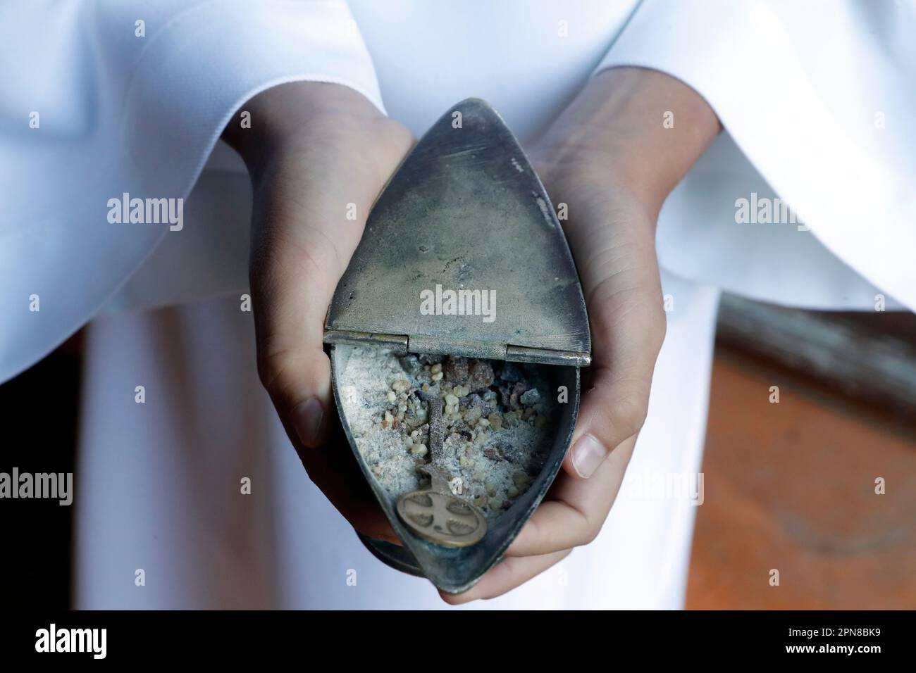 Catholic mass. Altar Boy with incense boat. France Stock Photo Alamy