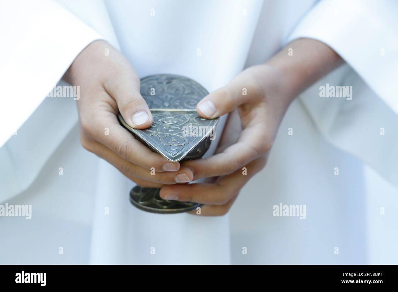 Catholic mass. Altar Boy with incense boat. France Stock Photo Alamy