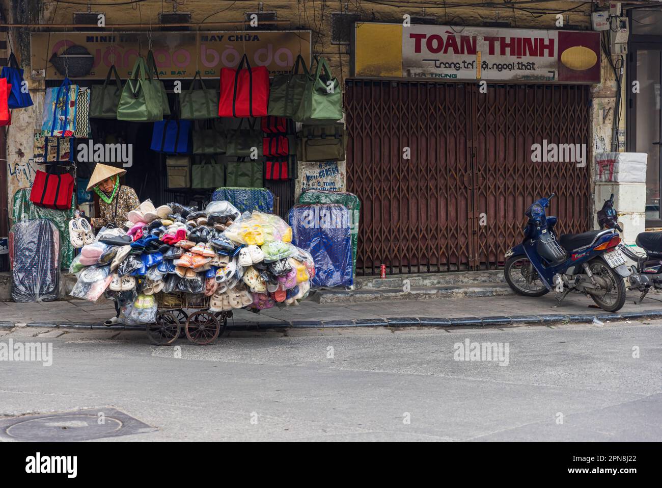 HANOI, VIETNAM DECEMBER 26 Street vendor in Hanoi Old Quarter on December 26 2022, Women