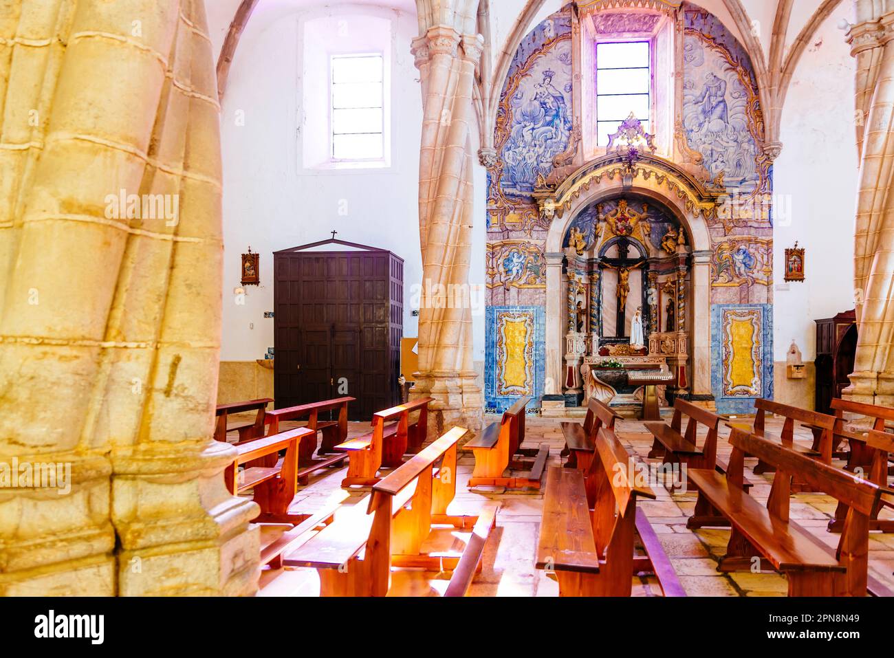 Partial view of the nave and chapels. The church of Santa María Magdalena in the square of the same name. Built in the Manueline style, which stems fr Stock Photo