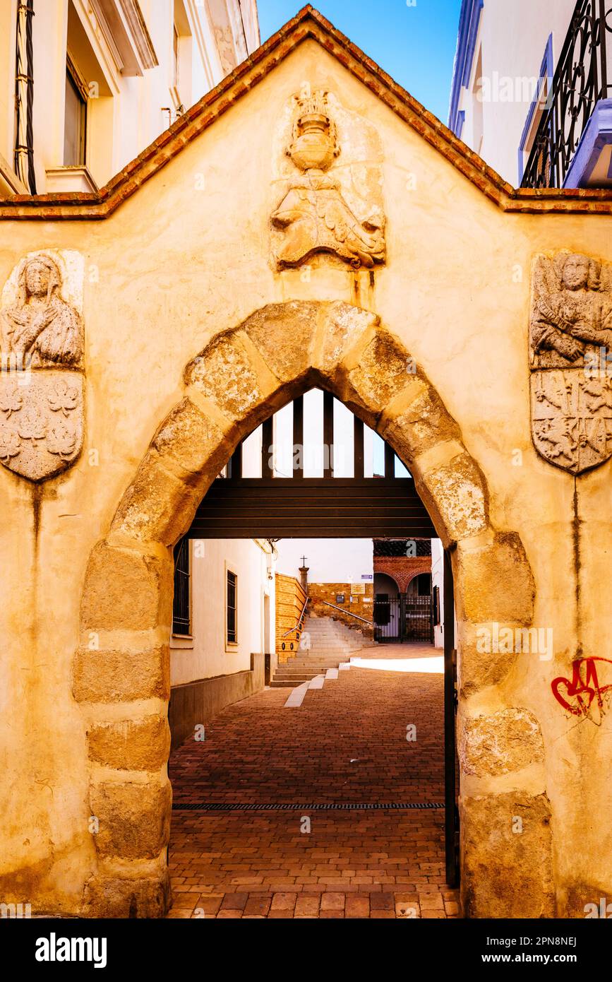Gothic entrance arch showing reliefs of the Annunciation on both sides ...