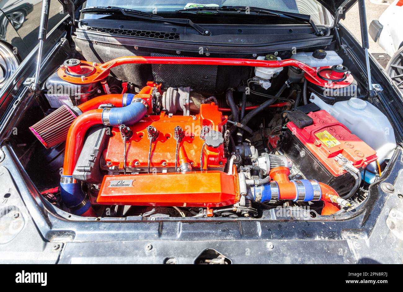 Samara, Russia - May 8, 2022: Tuned car engine with turbine of Lada 2170 Priora vehicle, under the hood of a vehicle. Motor with turbocharger Stock Photo