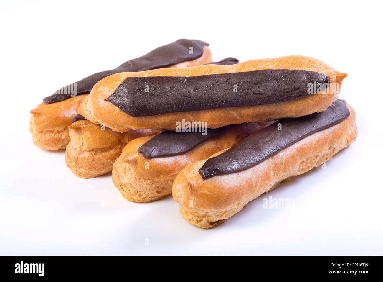 Chocolate eclairs on a white background. Sweet dessert Stock Photo