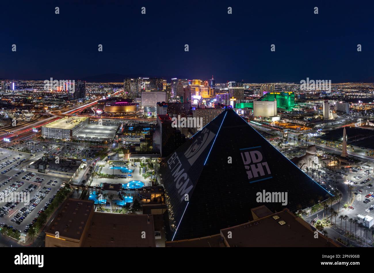 A picture of Las Vegas at night, with the Strip at the far center and the Luxor Hotel and Casino pyramid on the bottom. Stock Photo