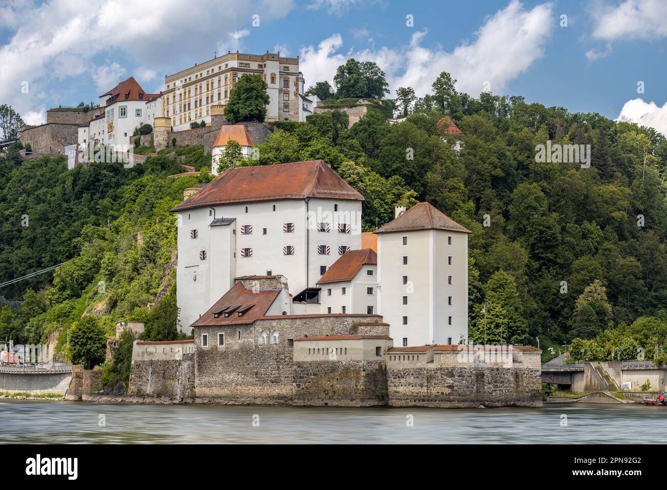 Veste Niederhaus, castle at the confluence of rivers Danube and Ilz, in front of Veste Oberhaus fortress in Passau, Bavaria, Germany Stock Photo