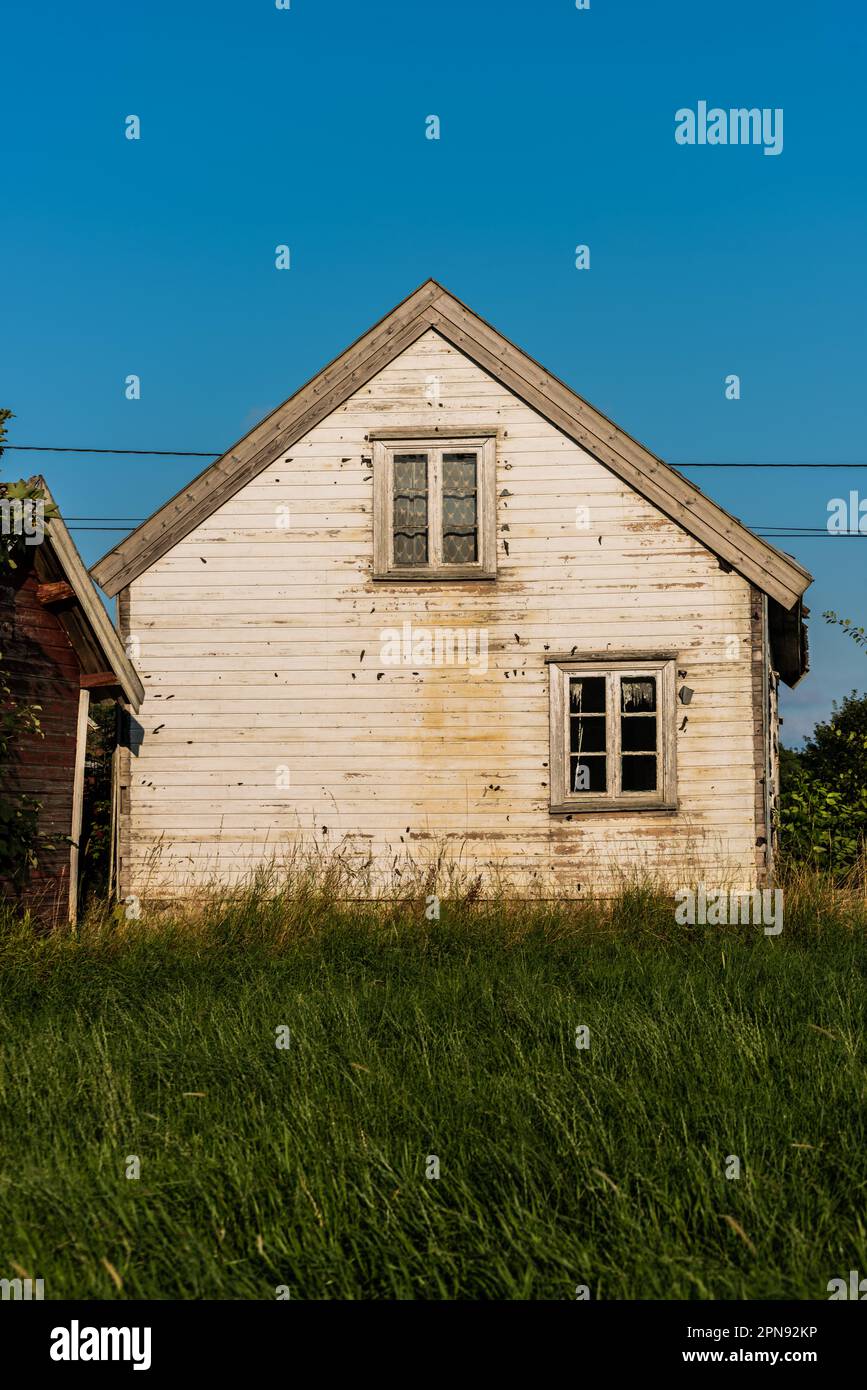 Old abandoned white wooden house Stock Photo - Alamy