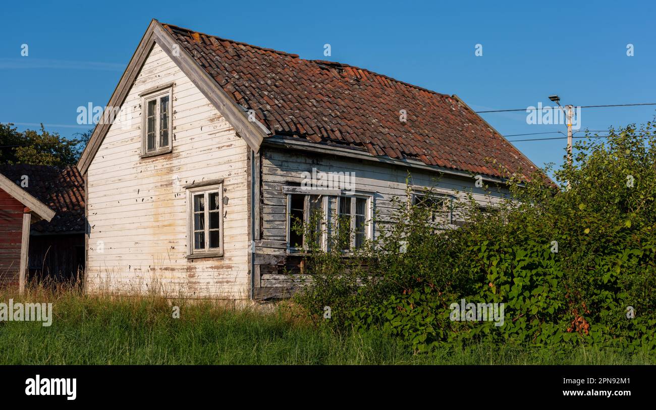 Old abandoned white wooden house Stock Photo - Alamy