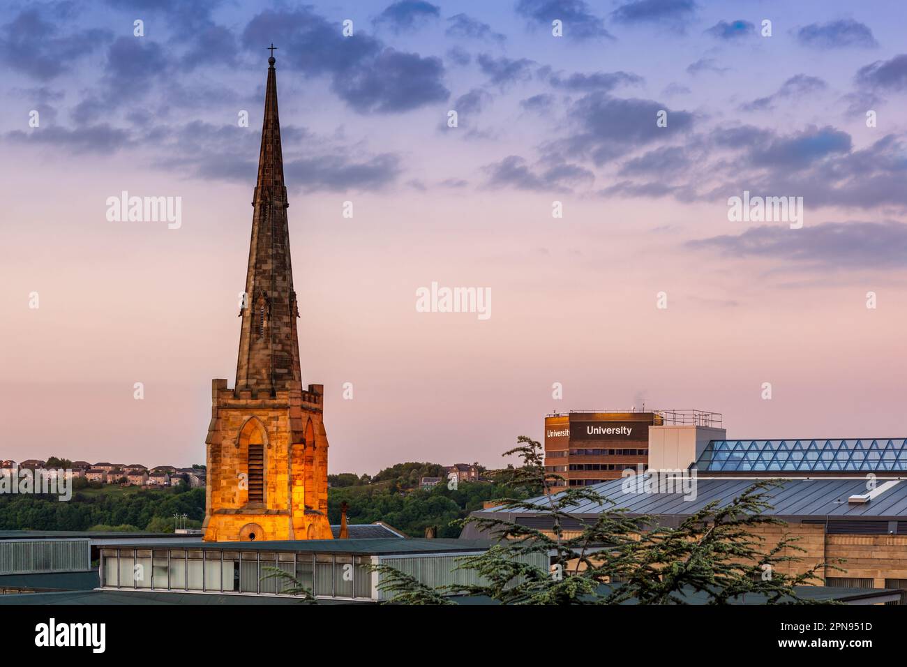 View of the university church lighted with cloudy skyline  on the Huddersfield UK Stock Photo