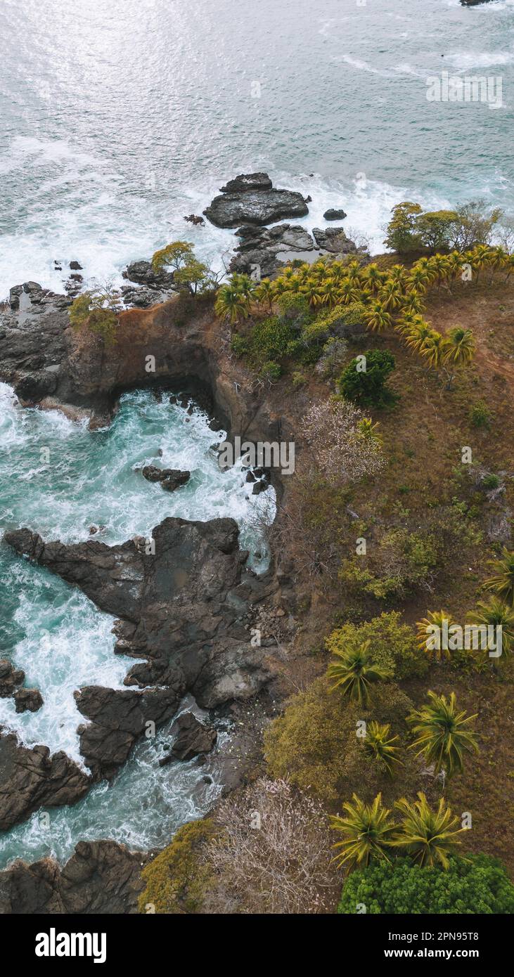 An aerial view of ocean waves splashing on rocks Stock Photo - Alamy
